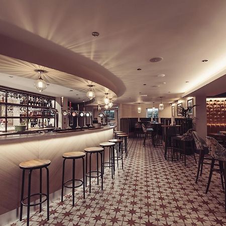 Longlands Inn & Cottages Карнфорт Екстер'єр фото The bar at the 2018 edition of the London Design Festival
