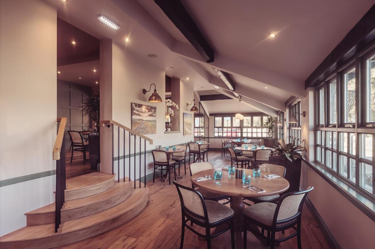 Longlands Inn & Cottages Карнфорт Екстер'єр фото The restaurant at the hotel