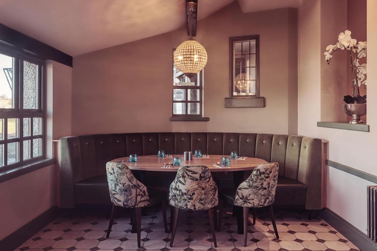 Longlands Inn & Cottages Карнфорт Екстер'єр фото The restaurant's interior