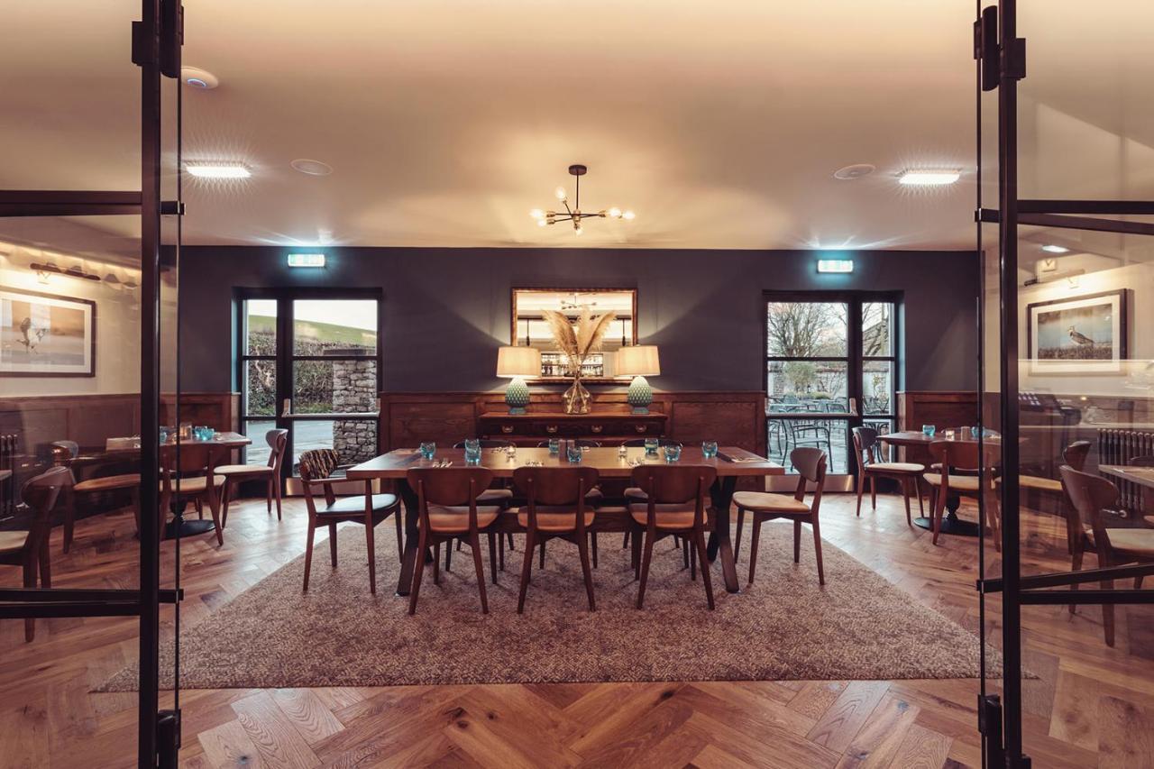 Longlands Inn & Cottages Карнфорт Екстер'єр фото The restaurant at the hotel