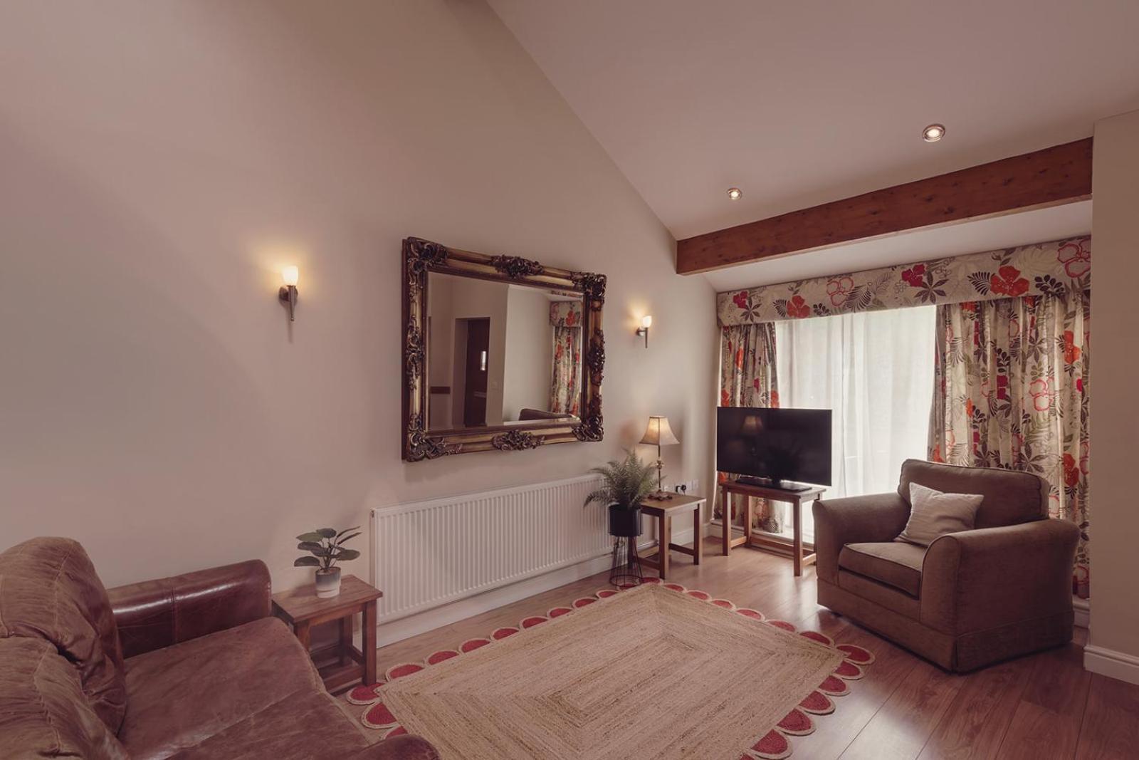 Longlands Inn & Cottages Карнфорт Екстер'єр фото The interior of a typical cottage at the resort